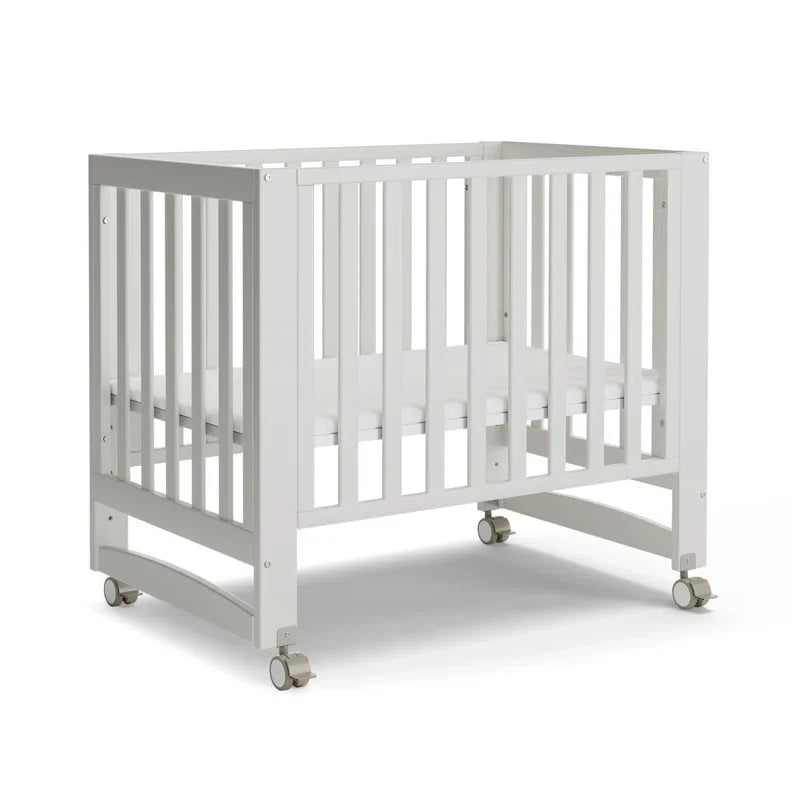 EvoNest 6-in-1 Portable Mini Crib with Mattress & 4 Height Adjustable, New Zealand Pinewood, White, MAMAZING