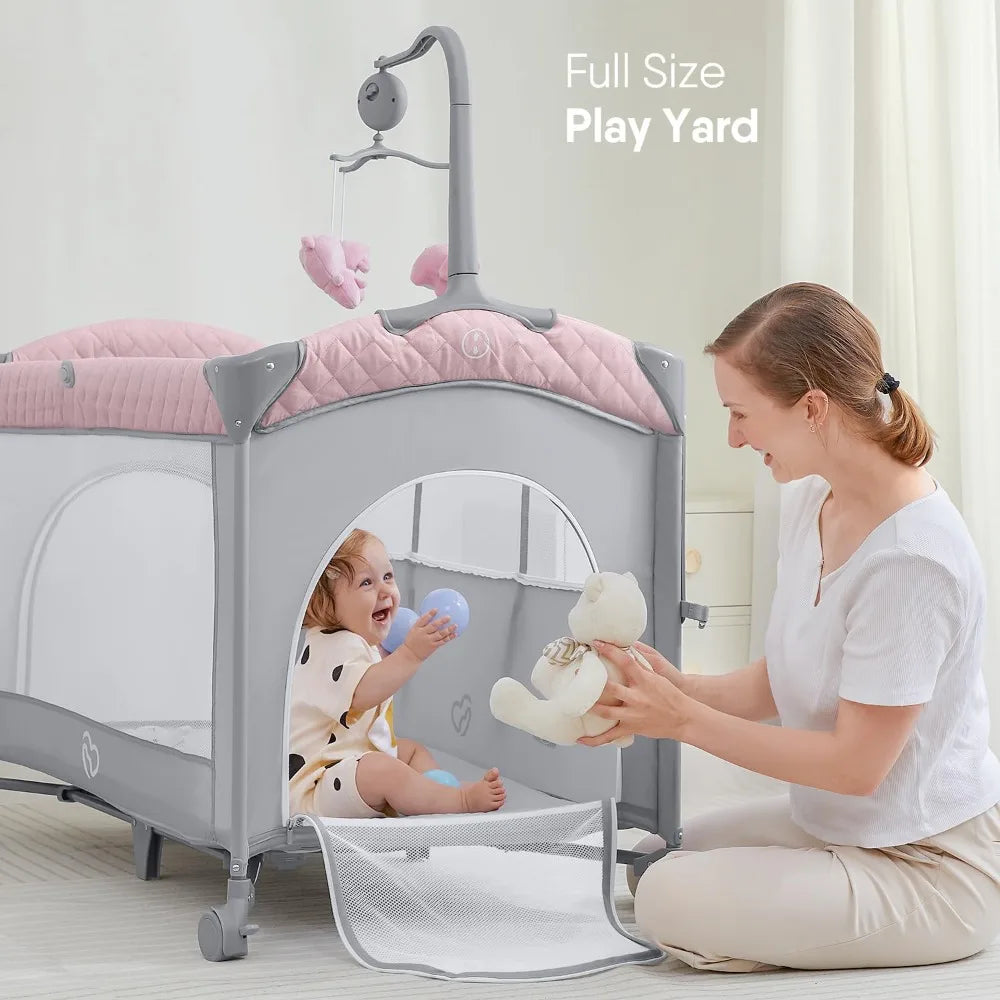 L Baby Bassinet Bedside Crib, Pack and Play with Mattress, Diaper Changer and Playards from Newborn to Toddles, Pink